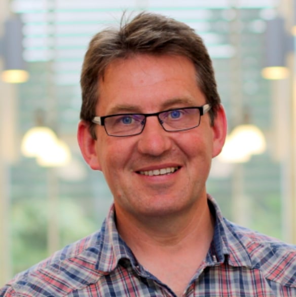 Professional headshot photo of Prof Barrie Wilkinson