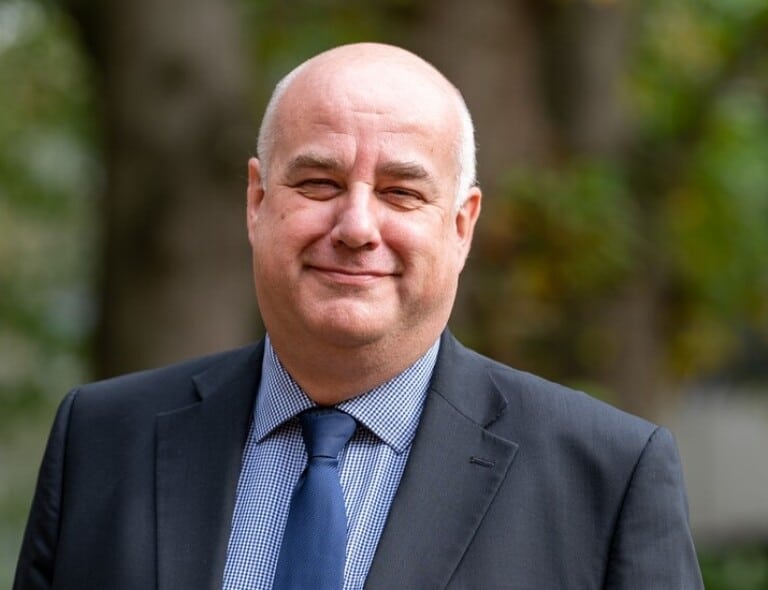 Professional headshot photo of Prof Mark Searcey