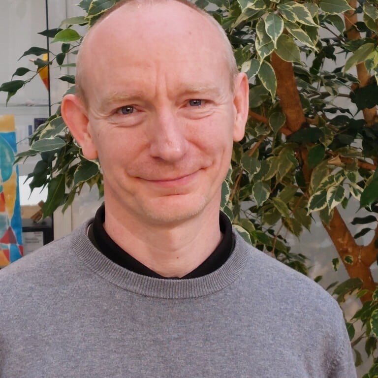 Professional headshot photo of Prof Jake Malone