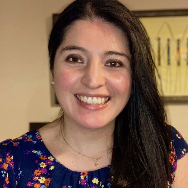 Professional headshot photo of Dr Marcela Hernández