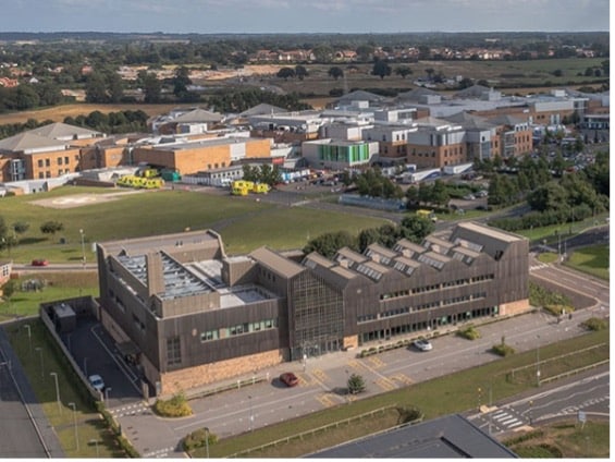 Aerial view of the Bob Champion Research and Education building and the Norfolk and Norwich University Hospital building