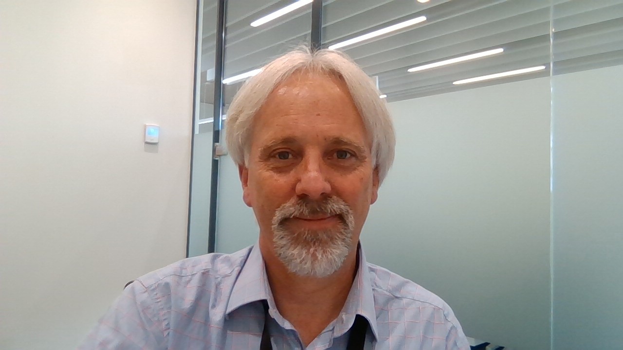 Professional headshot photo of Dr Simon Funnell