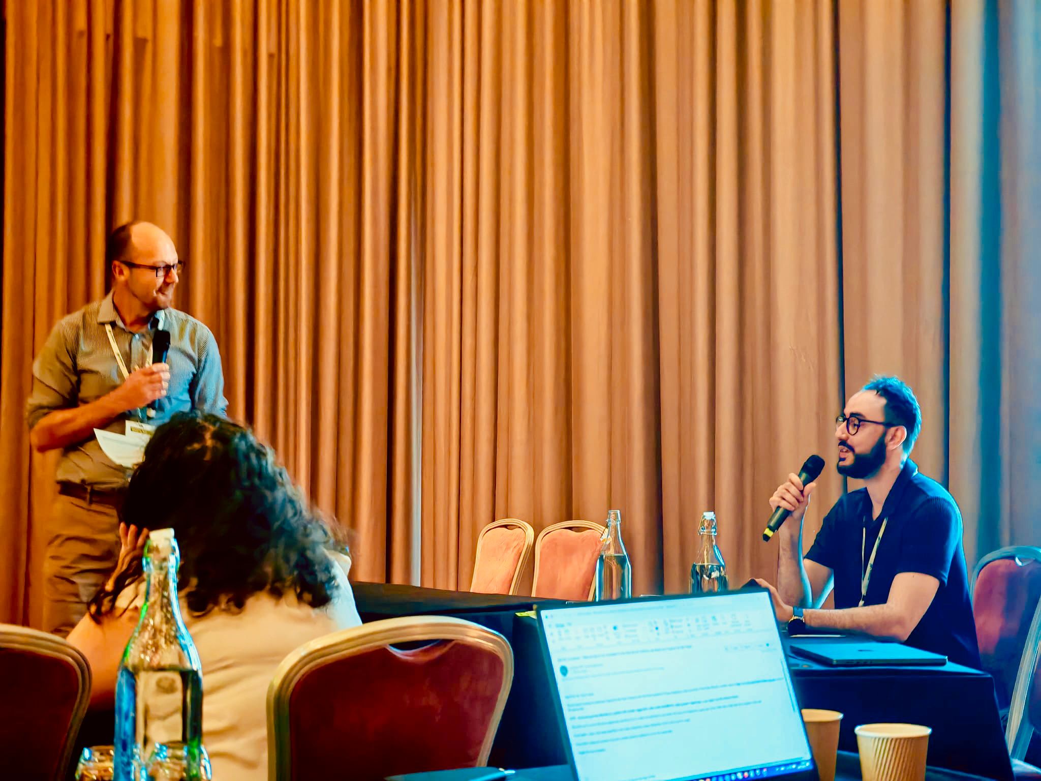 Dr Bilal Djeghout co-chairing a conference sessions with Professor Jeremy Webb