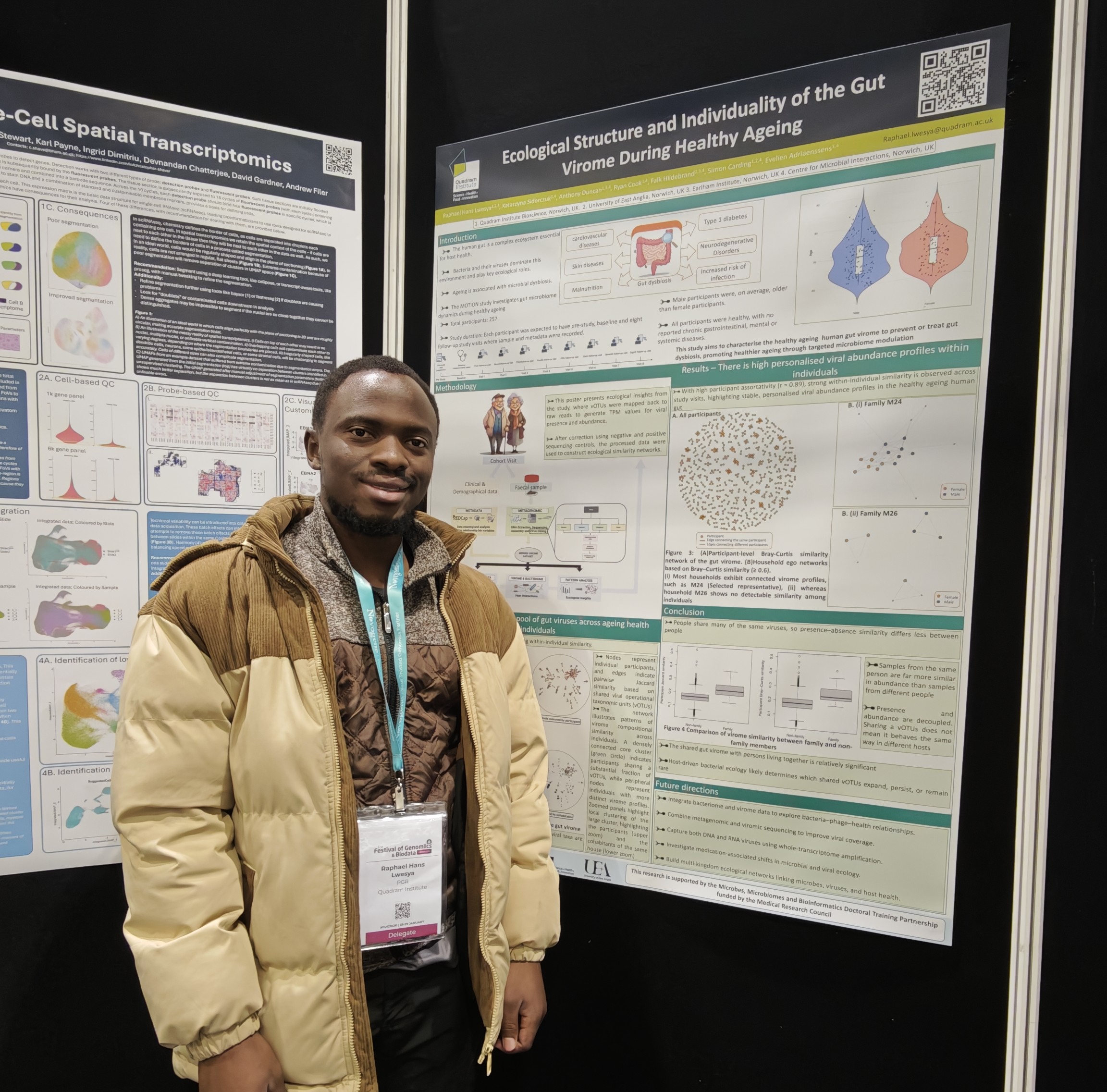 Raphael Hans Lwesya standing next to his research poster at the Festival of Genomics event