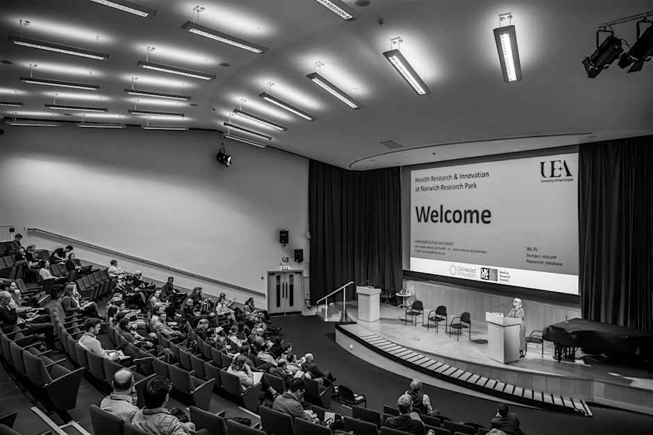 A black and white picture of a conference centre
